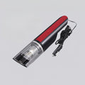 Portable vacuum cleaner with attachments on a gray background